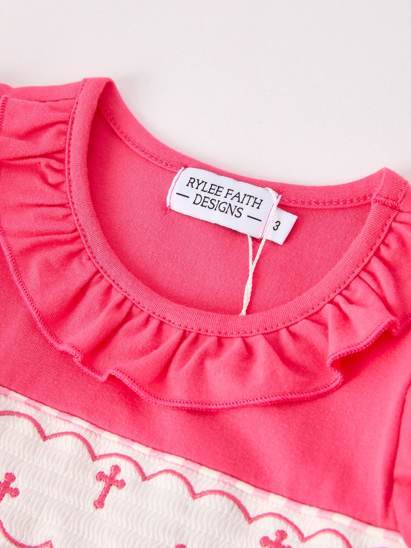 Rylee Faith Hot Pink Smocked Cross Dress - Image 3
